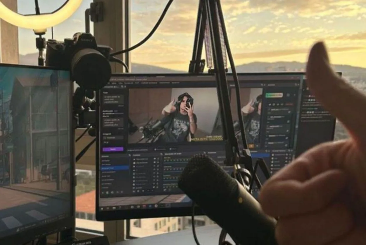 A creator's streaming desk at sunset
